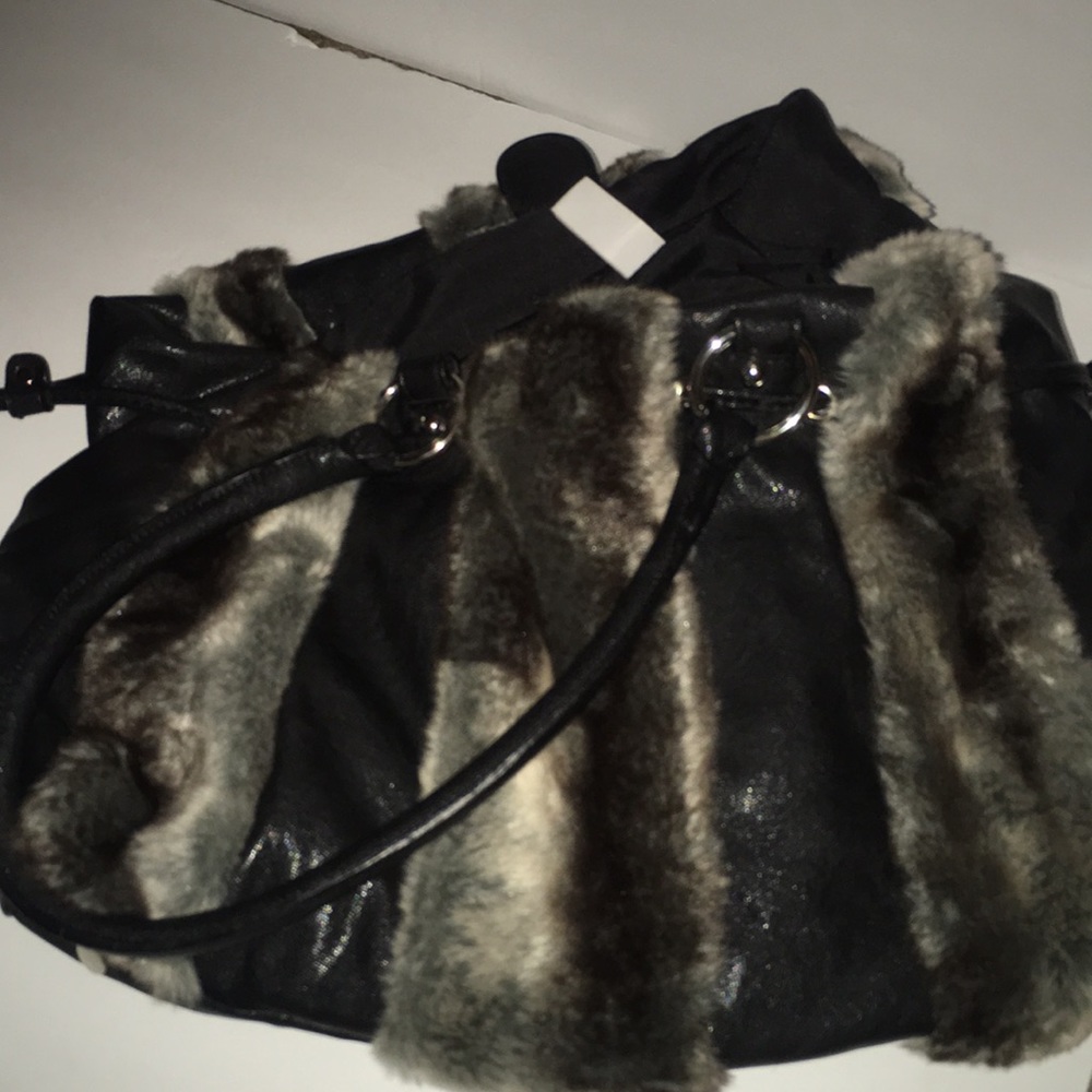 Pre owned Chico’s fur bag